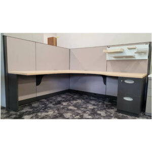 Steelcase L-Shape workstation with dark grey trim and light maple surface. File/file pedestal